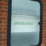 Part frosted window showing internal sign
